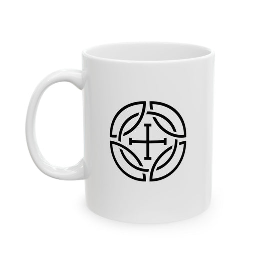A white ceramic mug with a black circular Celtic knot design featuring a cross in the center, shown on a clean white background.